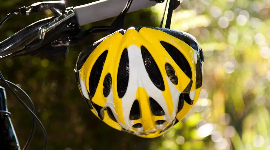 What are the four 4 steps to correctly fitting a bike helmet 